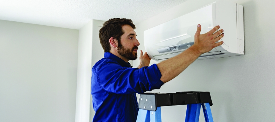 Man installing air handler